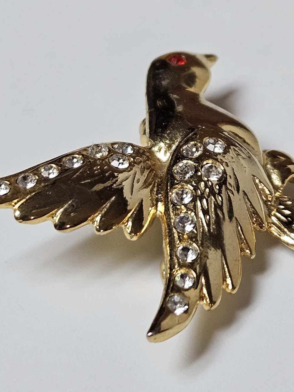 Gold Dove Brooch with Clear Crystals and Red Eye